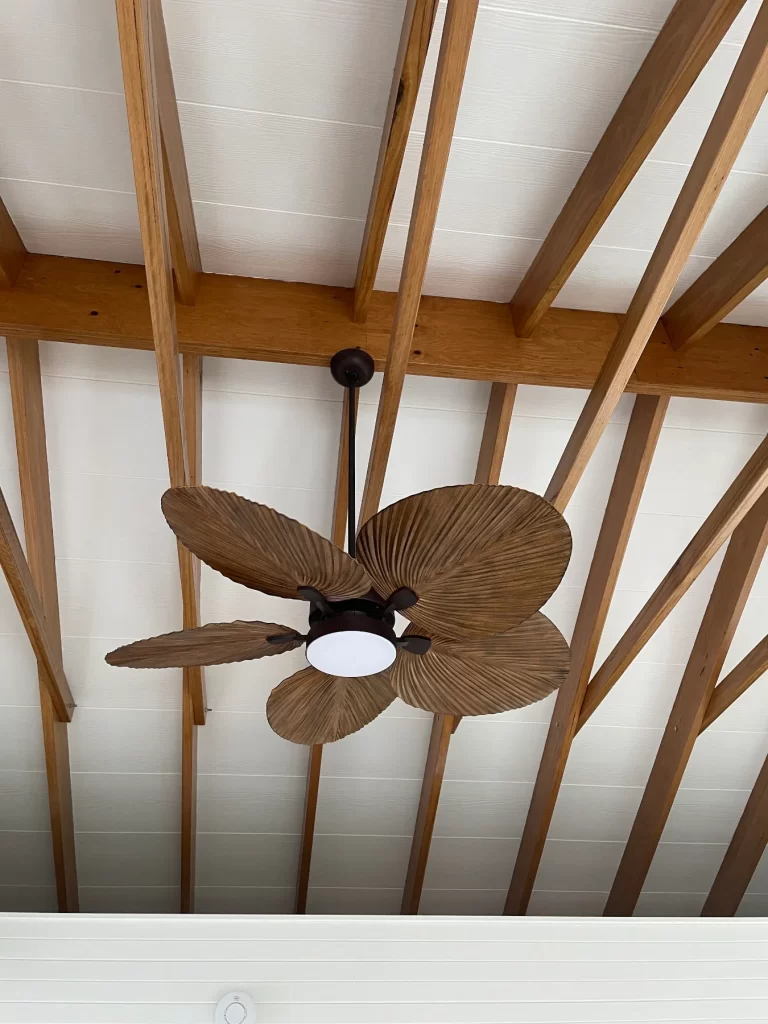 Ceiling fan installed beneath a timber-lined ceiling in a Brisbane home