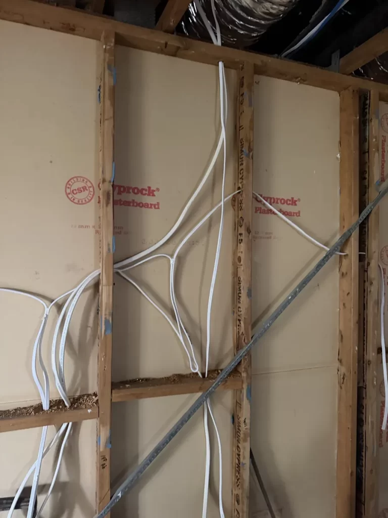 Electrical rough in for a granny flat in North Maclean: cables run through the wall frame before the linings go on