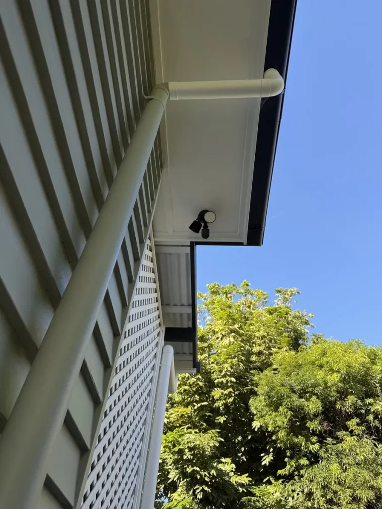 Outdoor lighting in Annerley: a new sensor light over a backyard studio walkway