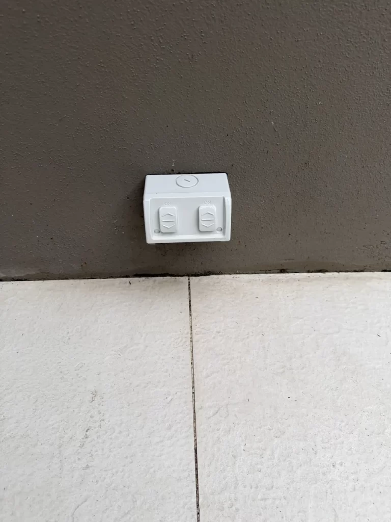Outdoor weatherproof power point installed on an external wall in Norman Park, Brisbane