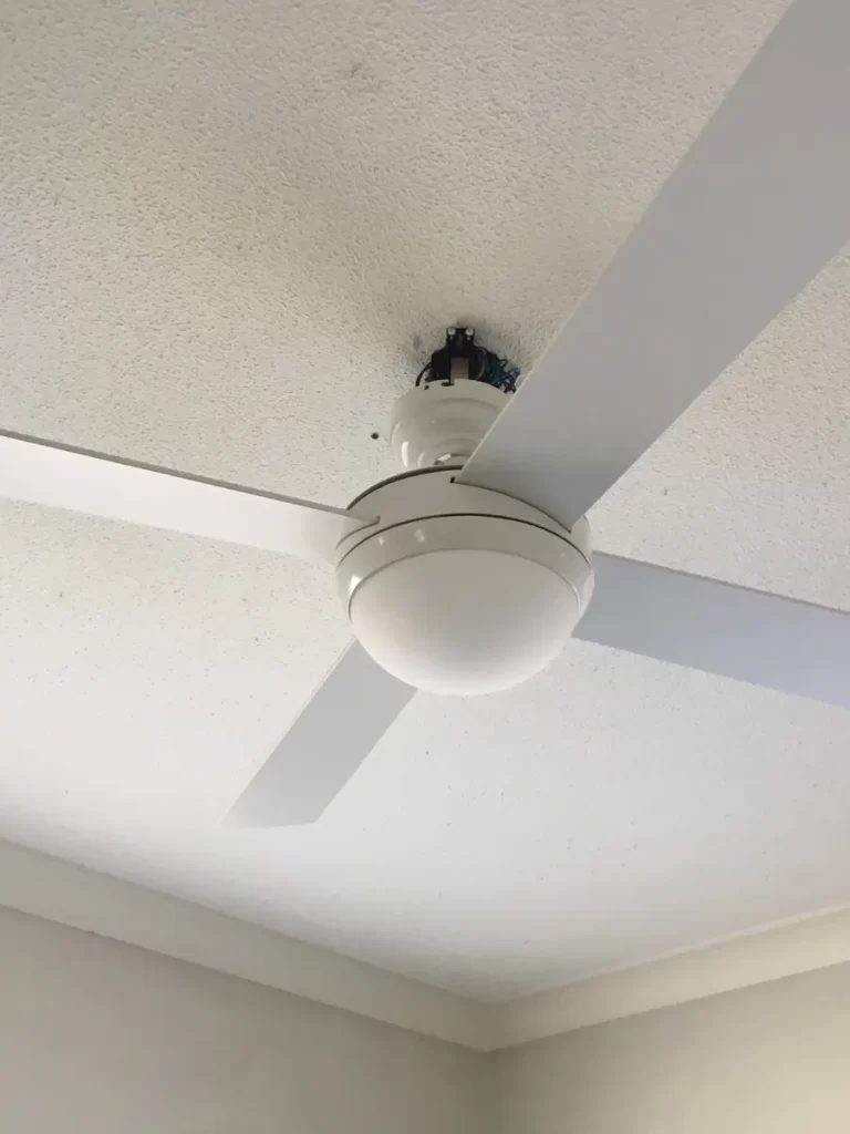Rental property electrician job in Everton Park: an owner-supplied ceiling fan installed and tested