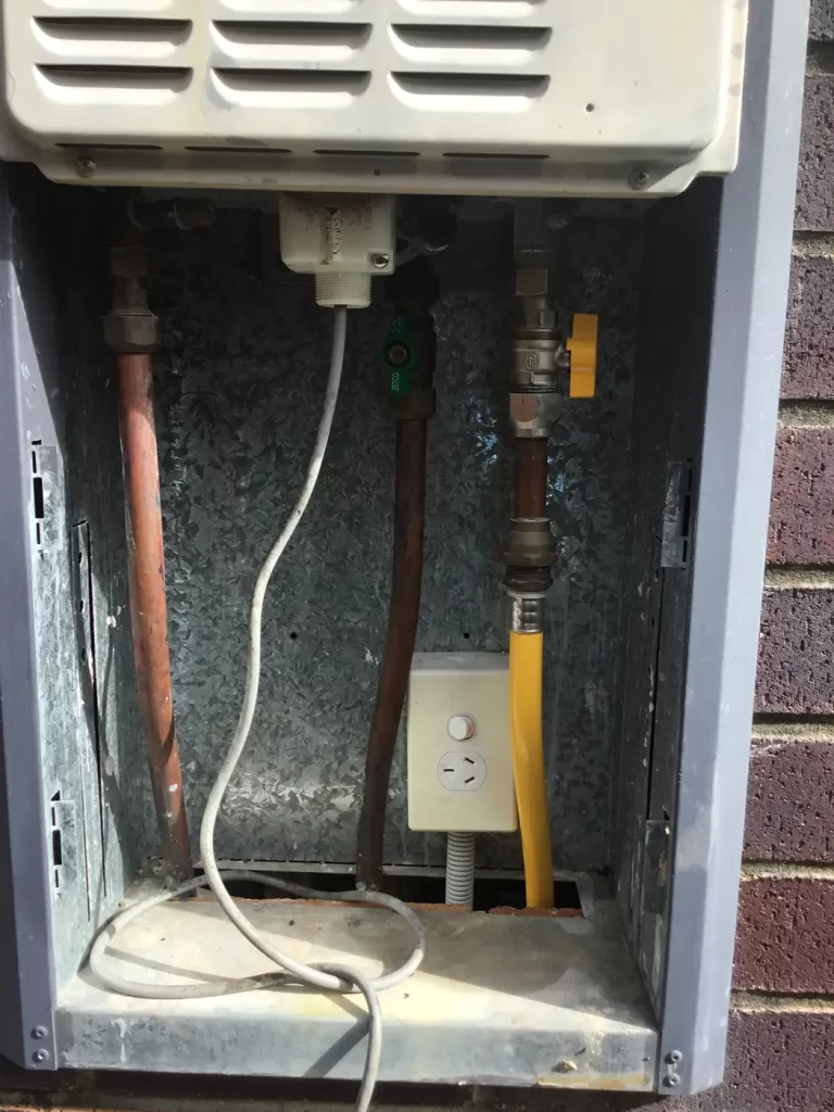 Power point inside a hot water cupboard where moisture was tripping the safety switch, Mount Gravatt East, Brisbane