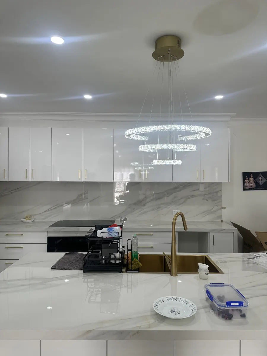 Renovation electrician work in a Kuraby kitchen: island bench power, downlights and a feature pendant