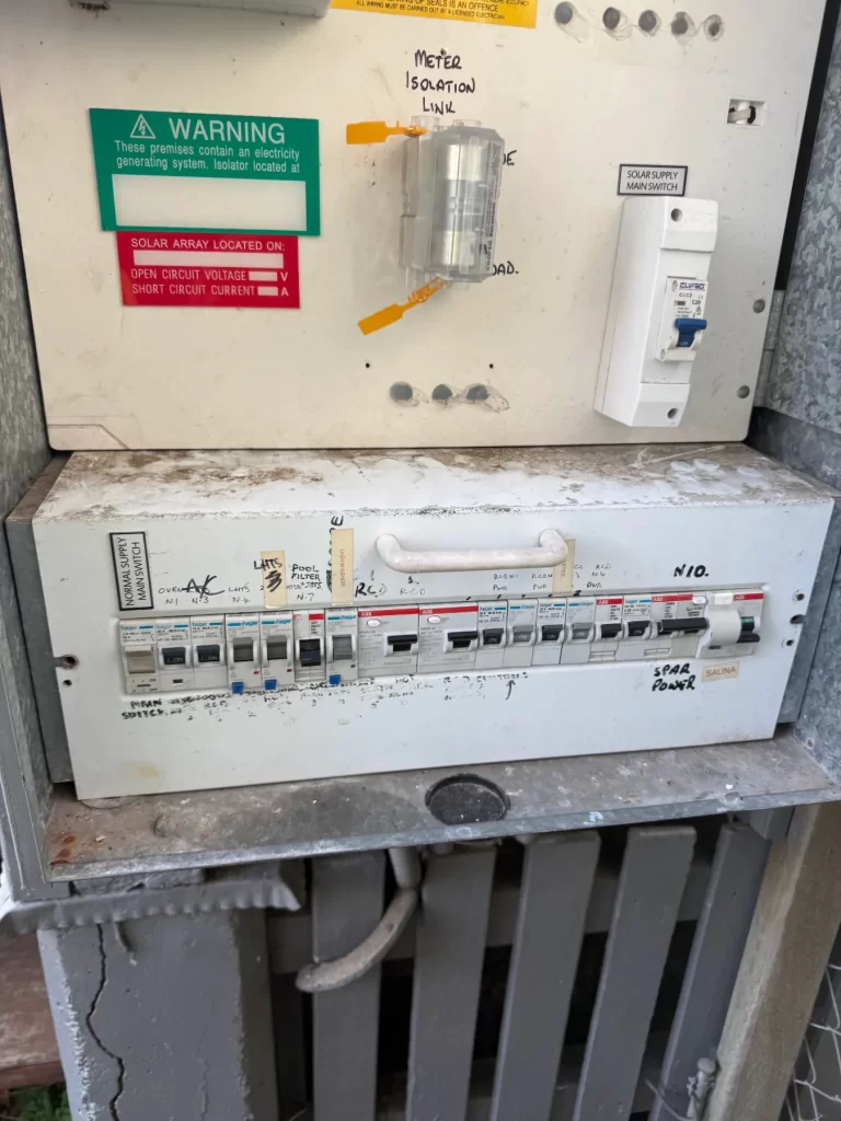 Switchboard with circuit breakers and safety switches in a Brisbane home