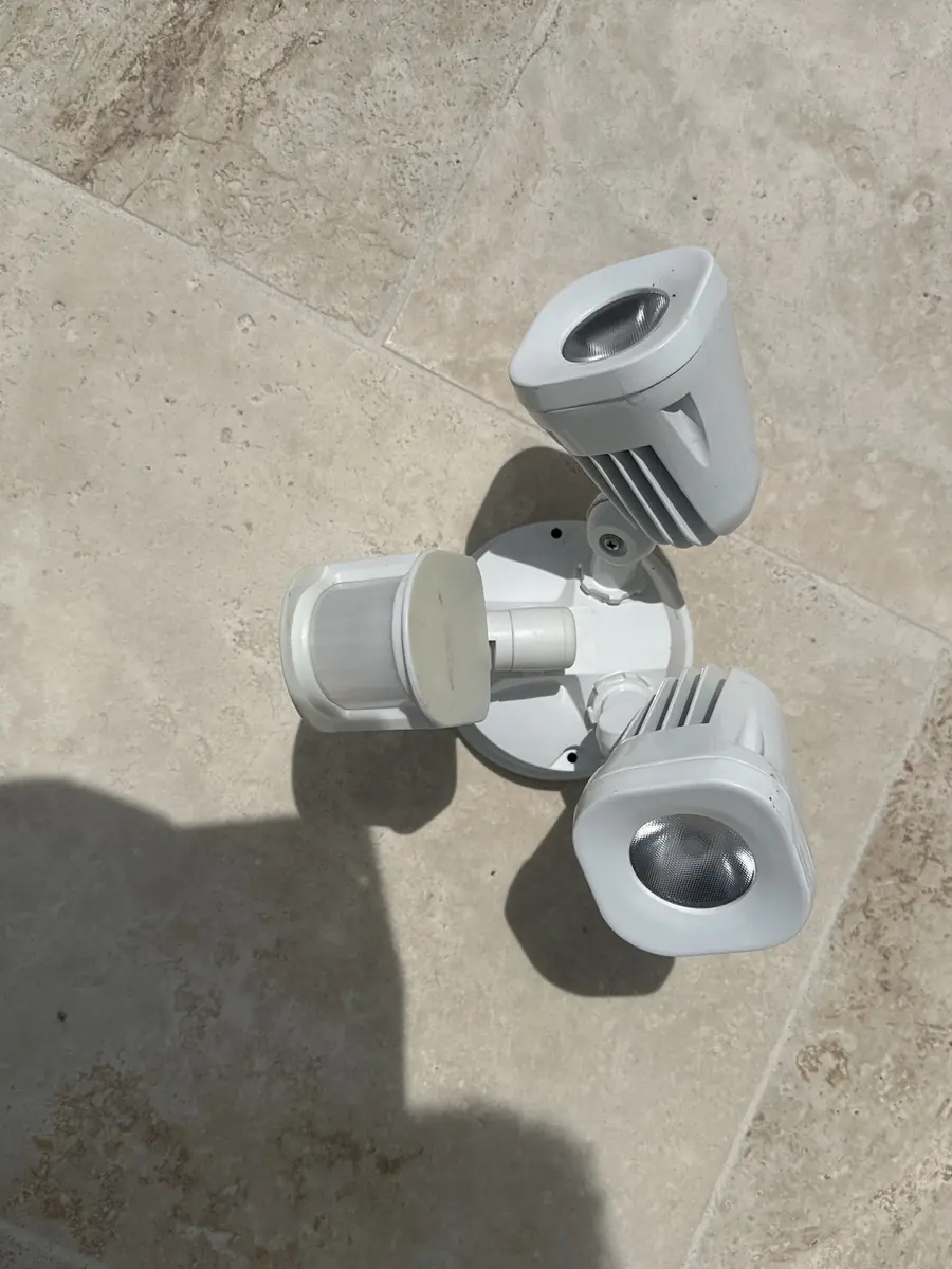 Twin spot sensor light checked while tracing a tripping lighting circuit in Holland Park West, a Holland Park electrician job