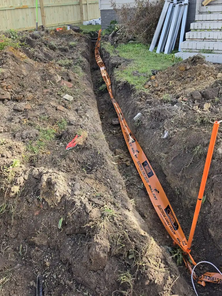Underground conduit and warning tape for a gate light in Cannon Hill, near Camp Hill, laid by our electrician